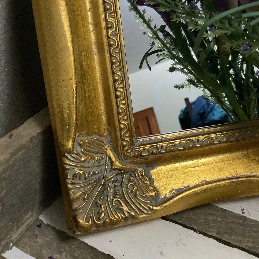 Ornate Gold Wall Mirror with Decorative Frame